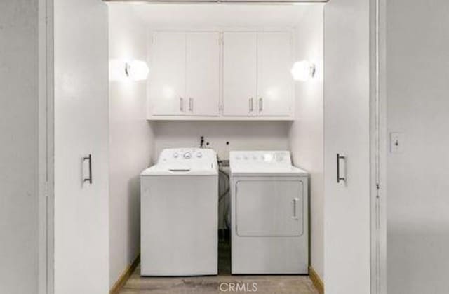 292 Heliotrope Dr, Lake Arrowhead, CA 92352 - washroom featuring washer and clothes dryer and cabinet space
