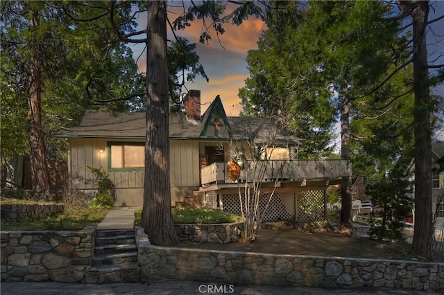 292 Heliotrope Dr, Lake Arrowhead, CA 92352 - chalet / cabin featuring stairway, a chimney, and a wooden deck