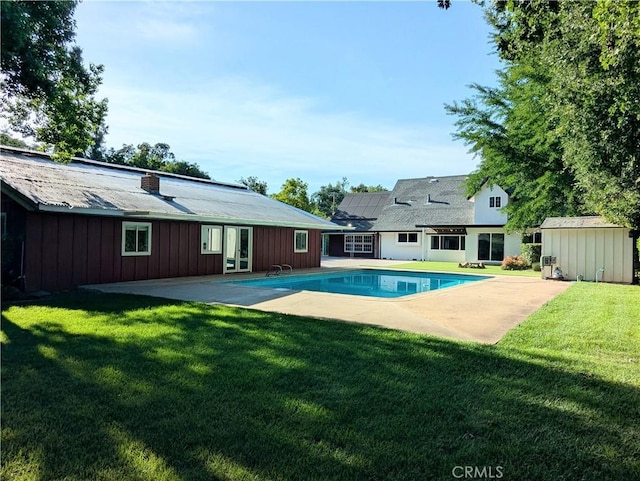 1785 Durham Dayton, Durham, CA 95938 - outdoor pool featuring french doors, a patio, a yard, and an outbuilding
