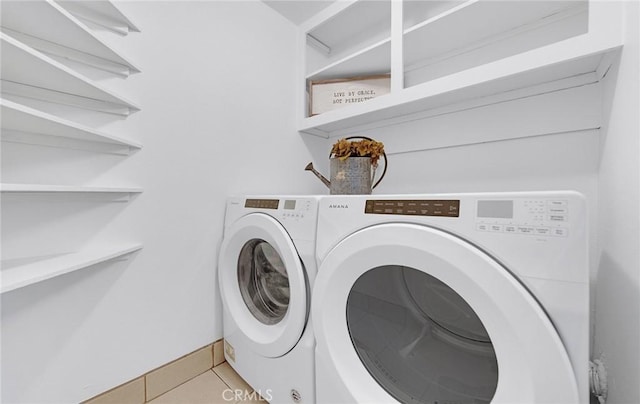 1785 Durham Dayton, Durham, CA 95938 - laundry area with washer and clothes dryer and light tile patterned floors
