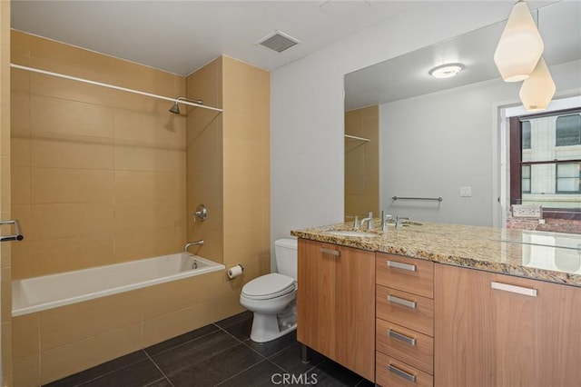 460 S Spring St Unit 1013, Los Angeles, CA 90013 - full bathroom featuring tiled shower / bath combo, vanity, and tile patterned floors