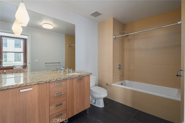 460 S Spring St Unit 1013, Los Angeles, CA 90013 - full bath featuring tiled shower / bath combo, double vanity, and tile patterned floors