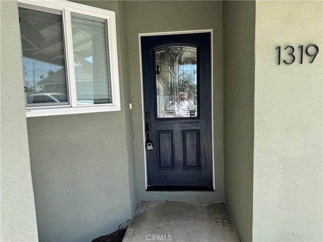 1319 E Monroe Ave, Orange, CA 92867 - entrance to property with stucco siding