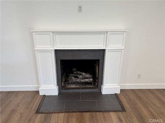 1319 E Monroe Ave, Orange, CA 92867 - detailed view of wood finished floors and a fireplace