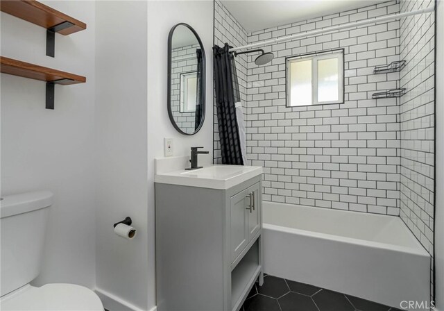 1319 E Monroe Ave, Orange, CA 92867 - full bathroom featuring tile patterned floors, vanity, and shower / tub combo with curtain