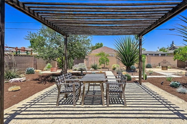1319 E Monroe Ave, Orange, CA 92867 - fenced backyard featuring a pergola, a patio, and outdoor dining space