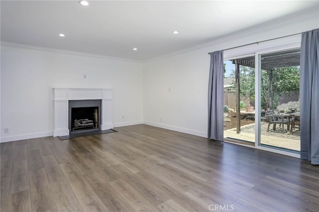 1319 E Monroe Ave, Orange, CA 92867 - unfurnished living room featuring crown molding, dark wood-type flooring, a fireplace with flush hearth, and recessed lighting
