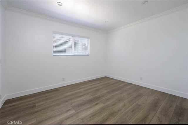 1319 E Monroe Ave, Orange, CA 92867 - spare room with dark wood-type flooring, crown molding, and recessed lighting
