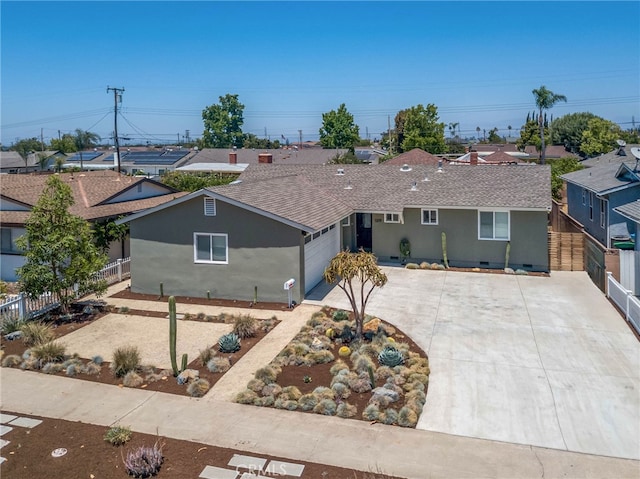 1319 E Monroe Ave, Orange, CA 92867 - ranch-style home featuring driveway, stucco siding, a shingled roof, an attached garage, and a residential view