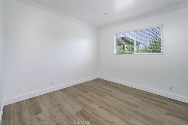 1319 E Monroe Ave, Orange, CA 92867 - unfurnished room featuring wood finished floors and crown molding
