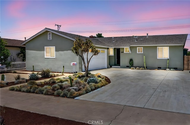 1319 E Monroe Ave, Orange, CA 92867 - single story home featuring stucco siding, driveway, an attached garage, and a shingled roof