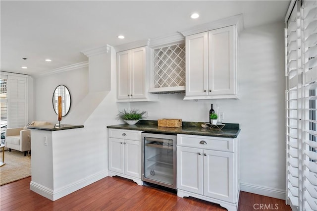 555 Esplanade Unit 320, Redondo Beach, CA 90277 - indoor dry bar with wine cooler, dark wood-type flooring, recessed lighting, and ornamental molding