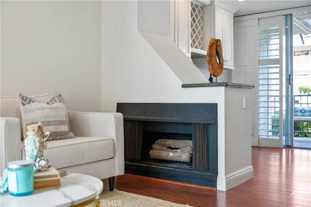 555 Esplanade Unit 320, Redondo Beach, CA 90277 - detailed view of wood finished floors and a fireplace