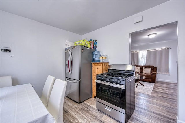 4430 W 166th St, Lawndale, CA 90260 - kitchen featuring stainless steel appliances and light wood-type flooring