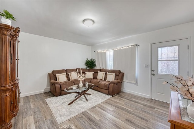 4430 W 166th St, Lawndale, CA 90260 - living area with light wood finished floors and baseboards