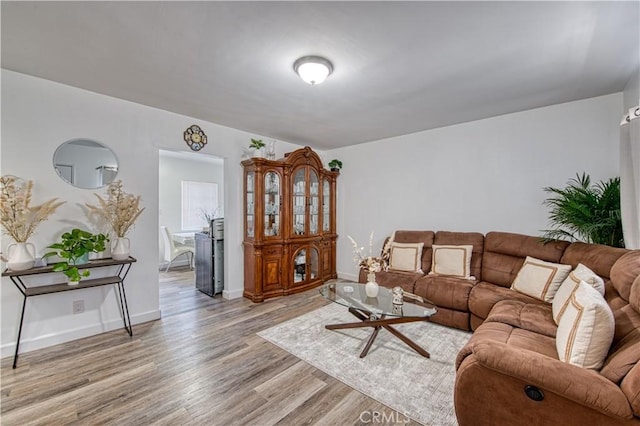 4430 W 166th St, Lawndale, CA 90260 - living room featuring light wood finished floors and baseboards