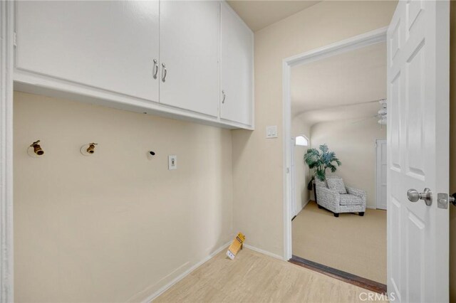313 S Pickering Way, Montebello, CA 90640 - washroom with electric dryer hookup, light wood-style flooring, ceiling fan, and cabinet space