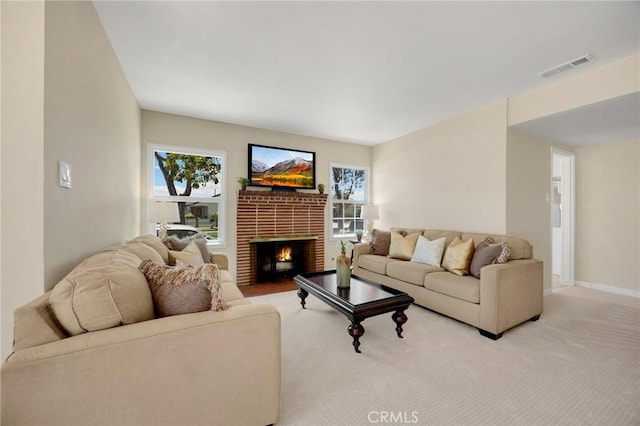 313 S Pickering Way, Montebello, CA 90640 - living room featuring healthy amount of natural light and a brick fireplace