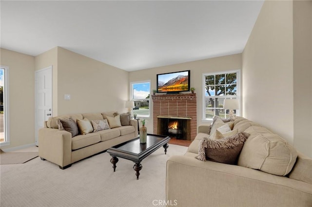 313 S Pickering Way, Montebello, CA 90640 - carpeted living room with a brick fireplace and baseboards