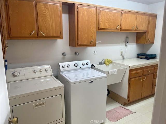 28957 Glen Oaks Dr, Menifee, CA 92586 - laundry room featuring cabinet space and washer and dryer