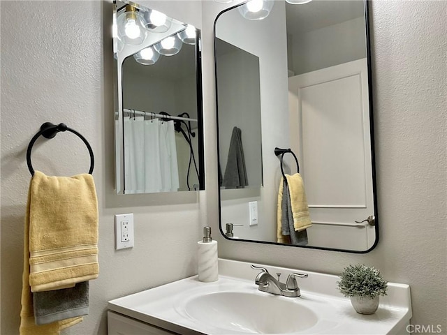 22801 Nolan St, Lake Forest, CA 92630 - full bath with vanity and a textured wall