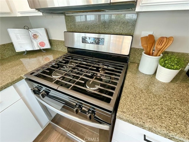 22801 Nolan St, Lake Forest, CA 92630 - kitchen view of gas range and white cabinetry