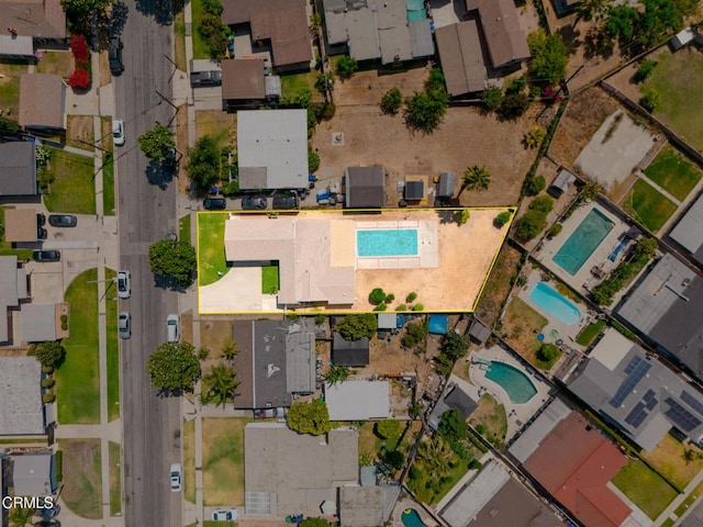 9818 Firebird Ave, Whittier, CA 90605 - aerial view of residential area with a pool and property parcel outlined