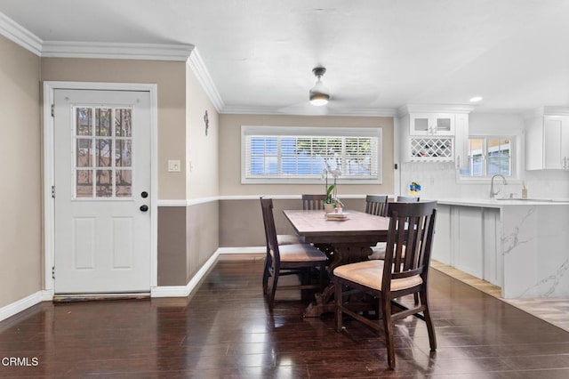 9818 Firebird Ave, Whittier, CA 90605 - dining space with dark wood-style flooring, plenty of natural light, crown molding, and ceiling fan