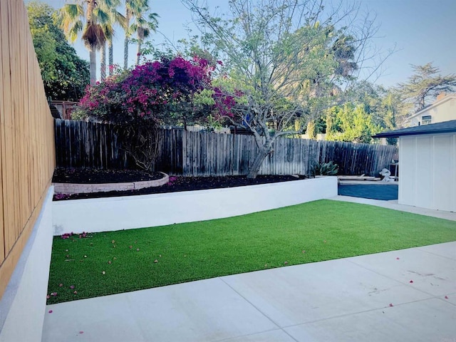 7118 Stanford Ave, La Mesa, CA 91942 - fenced backyard featuring a patio