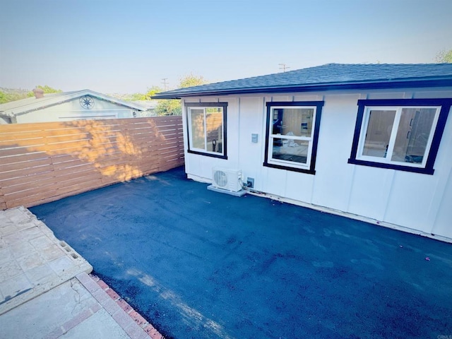 7118 Stanford Ave, La Mesa, CA 91942 - back of property with a shingled roof and board and batten siding