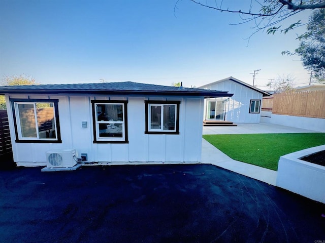 7118 Stanford Ave, La Mesa, CA 91942 - back of property with board and batten siding, a patio, and a shingled roof