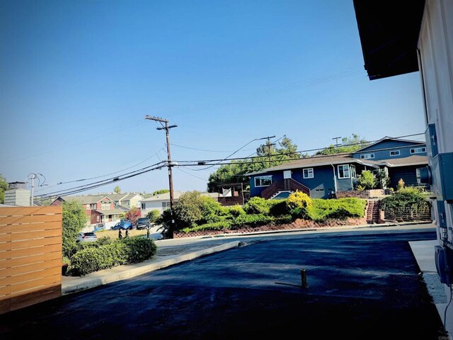 7118 Stanford Ave, La Mesa, CA 91942 - view of street featuring a residential view, curbs, and sidewalks