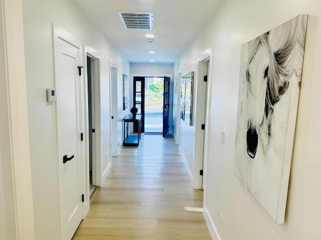 7118 Stanford Ave, La Mesa, CA 91942 - hallway featuring light wood finished floors and baseboards