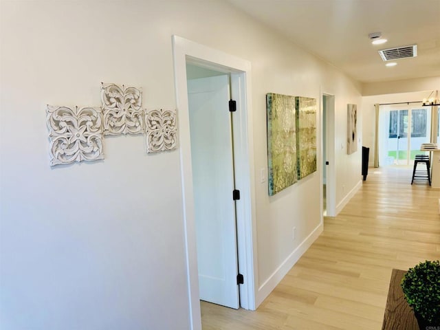 7118 Stanford Ave, La Mesa, CA 91942 - corridor featuring baseboards and light wood-type flooring