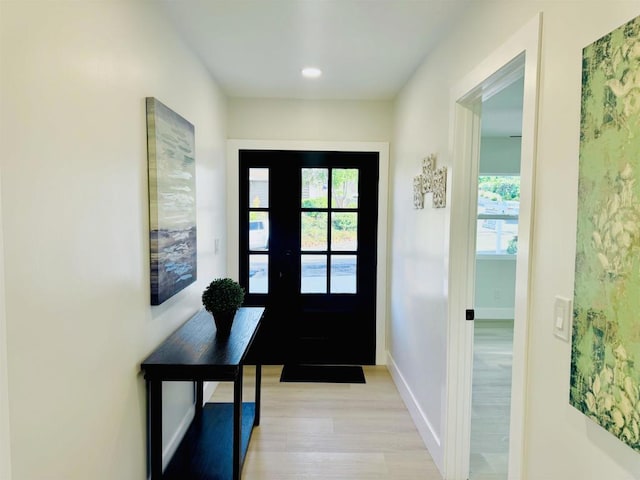 7118 Stanford Ave, La Mesa, CA 91942 - entrance foyer with light wood-style floors and recessed lighting