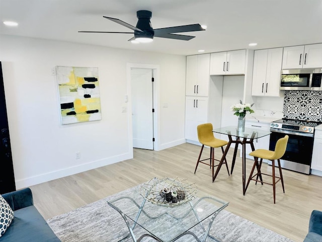 7118 Stanford Ave, La Mesa, CA 91942 - living area featuring ceiling fan, light wood-style floors, and recessed lighting