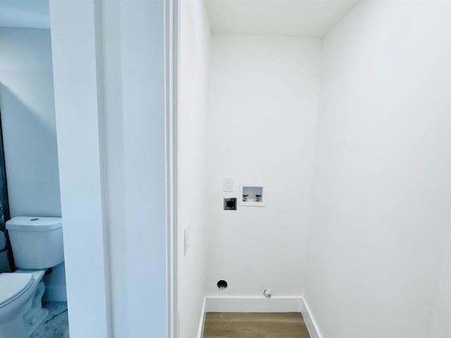 7118 Stanford Ave, La Mesa, CA 91942 - laundry area with washer hookup and wood finished floors