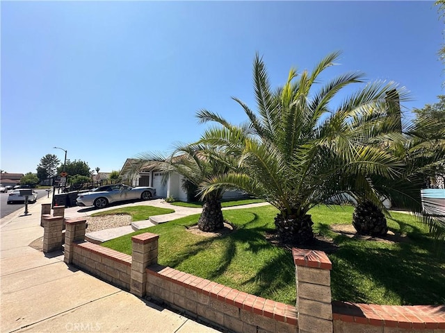 13191 Honeybee St, Moorpark, CA 93021 - obstructed view of property featuring a front lawn