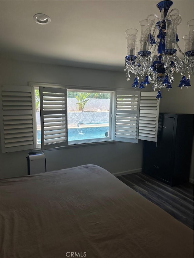 13191 Honeybee St, Moorpark, CA 93021 - unfurnished bedroom with wood finished floors and baseboards