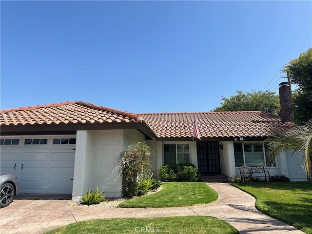 13191 Honeybee St, Moorpark, CA 93021 - view of front facade with a garage, stucco siding, a tiled roof, and a front yard
