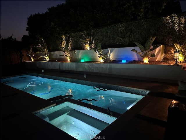 13191 Honeybee St, Moorpark, CA 93021 - pool at twilight with an in-ground hot tub