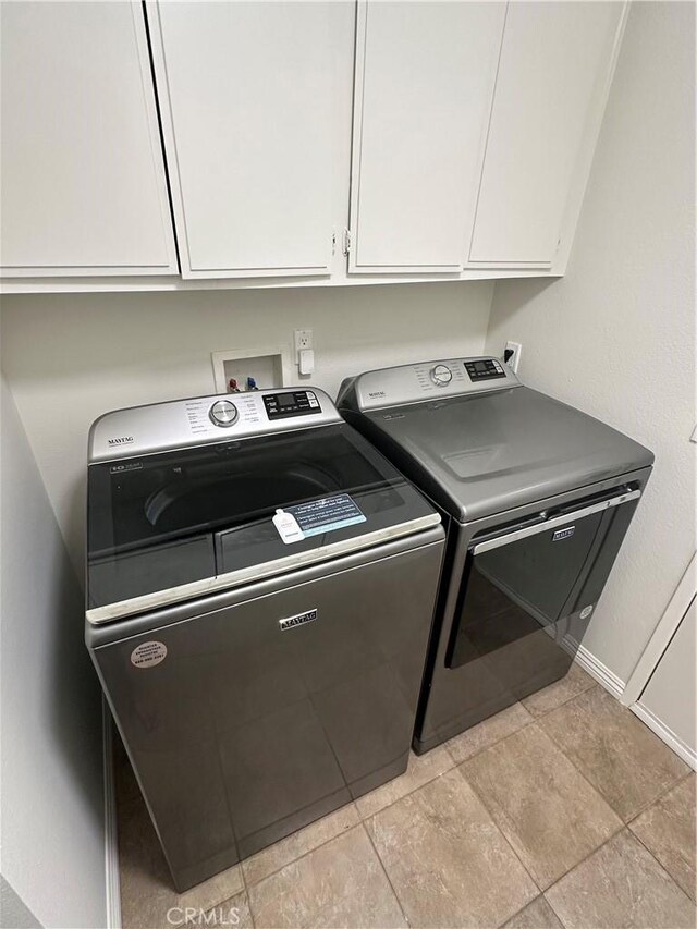 13191 Honeybee St, Moorpark, CA 93021 - laundry area with cabinet space and separate washer and dryer