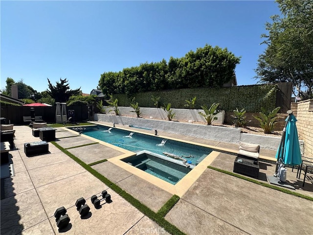 13191 Honeybee St, Moorpark, CA 93021 - view of swimming pool featuring an in-ground hot tub, a patio, and a fenced backyard