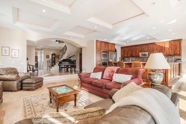 2110 Ravoli Dr, Oxnard, CA 93035 - living room with arched walkways, stairs, ornamental molding, coffered ceiling, and recessed lighting
