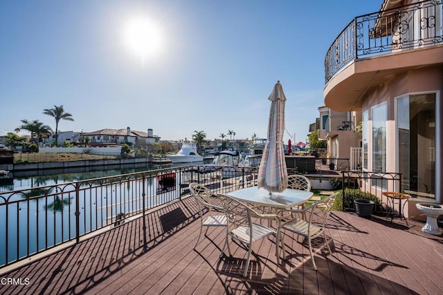 2110 Ravoli Dr, Oxnard, CA 93035 - wooden deck featuring a water view and outdoor dining area