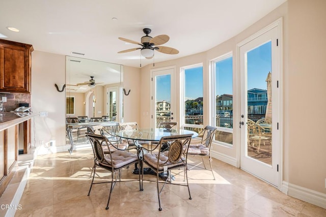 2110 Ravoli Dr, Oxnard, CA 93035 - dining room with ceiling fan and baseboards
