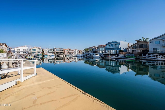 2110 Ravoli Dr, Oxnard, CA 93035 - water view featuring nearby suburban area and a boat dock