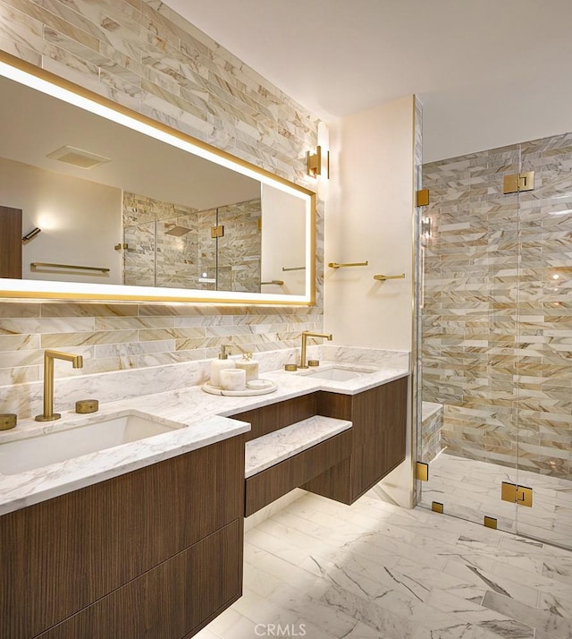 26144 Kenrose Cir, Calabasas, CA 91302 - full bath with double vanity, a stall shower, and marble finish flooring