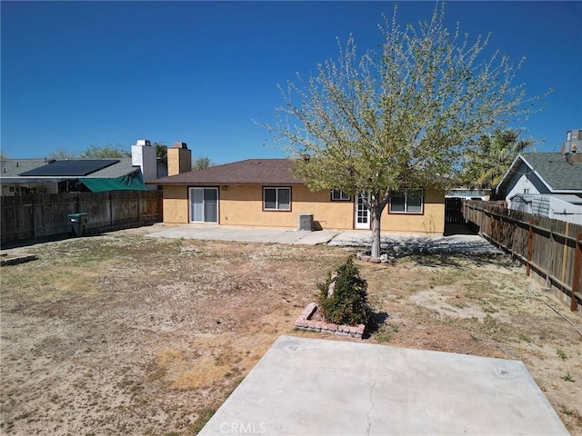 37334 55th St E, Palmdale, CA 93552 - rear view of house with a patio, a fenced backyard, and stucco siding