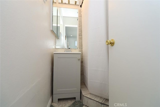 37334 55th St E, Palmdale, CA 93552 - full bathroom with vanity and a shower with shower curtain